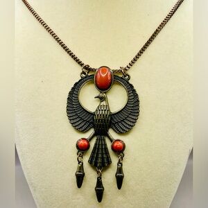 Vintage large Egyptian falcon bird pendant with red coral cabochons. 24 inches.